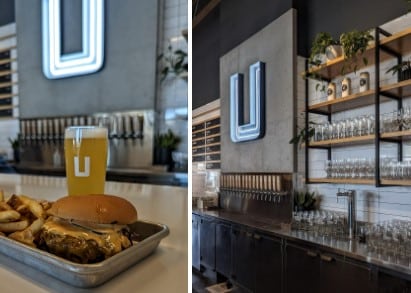 Photo of Uprise Brewing Co beer along with their famous smashburger