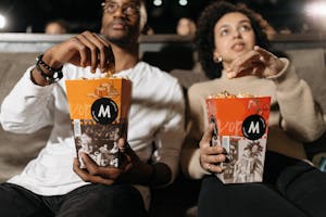 Couple Eating Popcorn Together