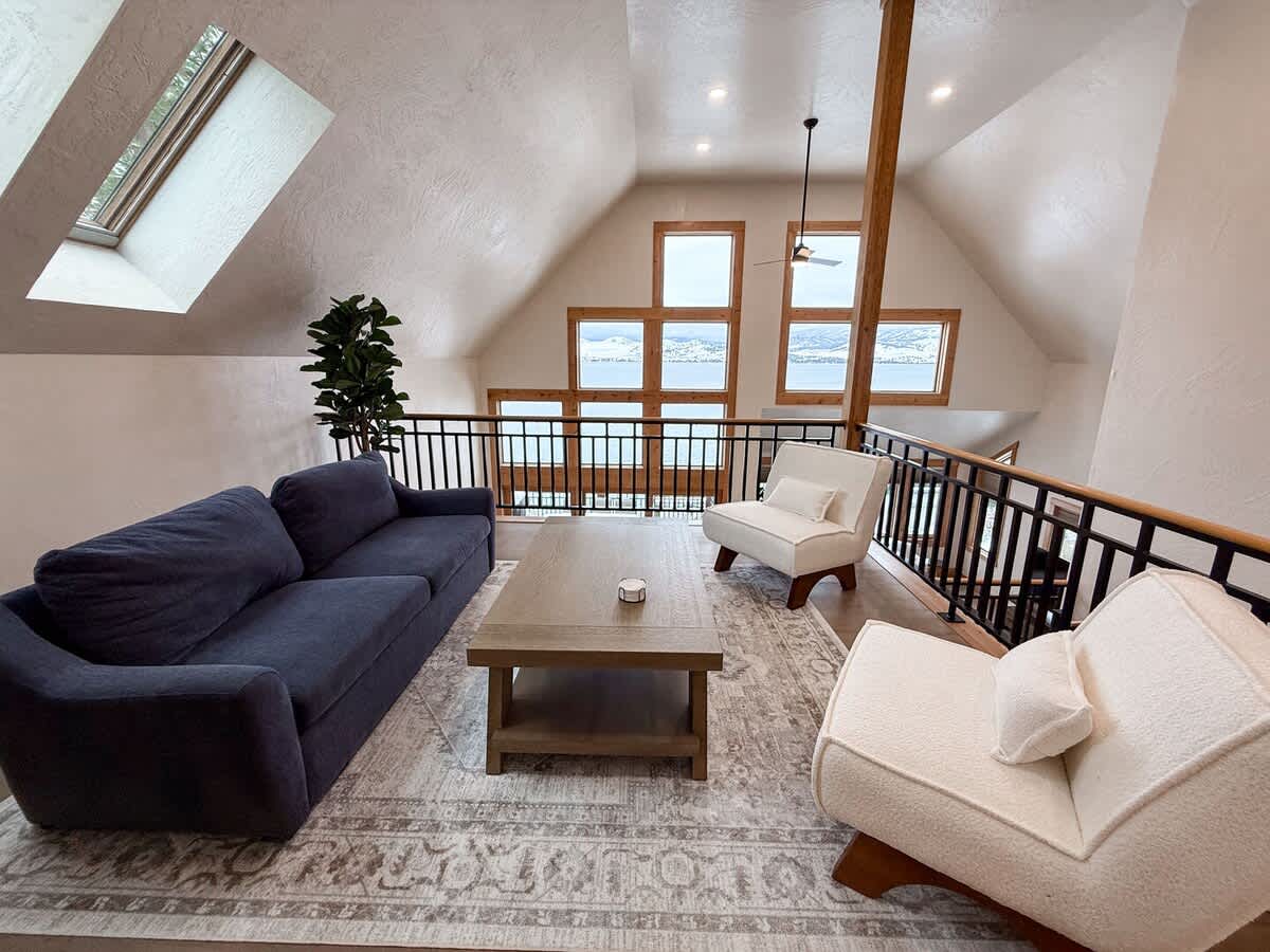 The beautiful home overlooking the water with the sunset.  If you've been hunting for a luxury Montana vacation that will take your breath away, look no further.