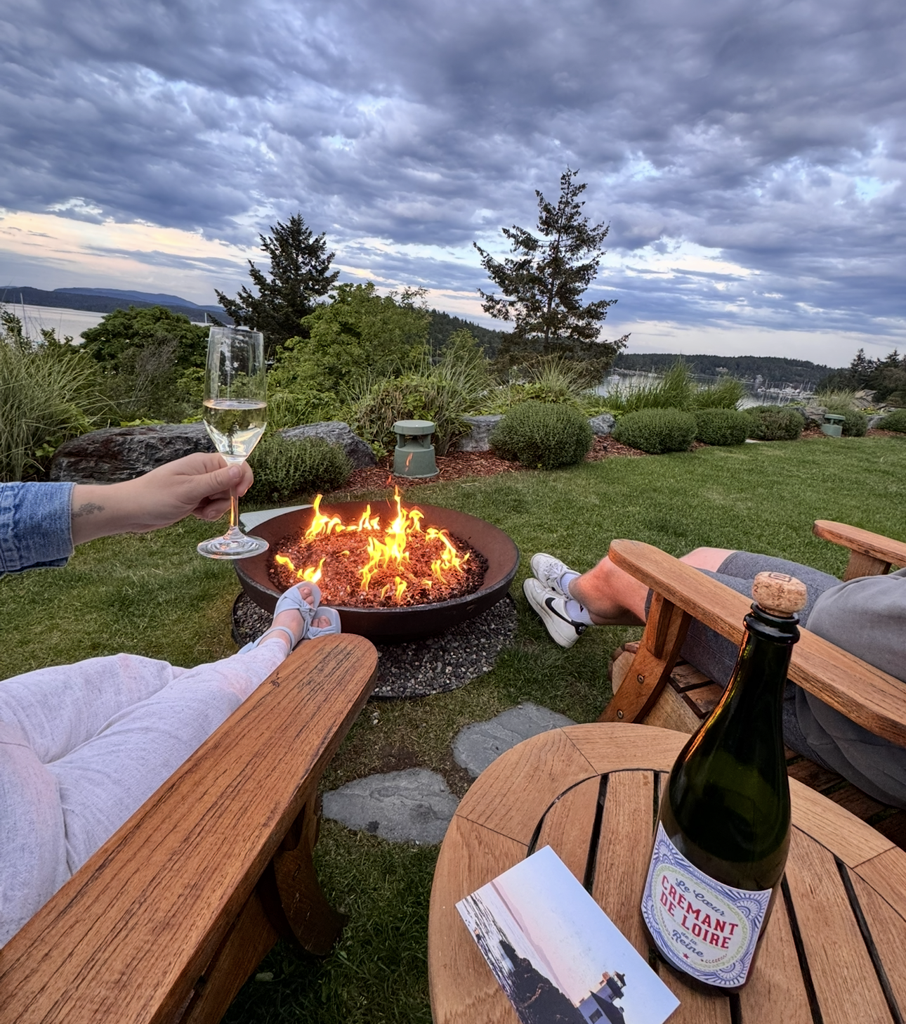 Enjoying wine by the fireplace at Friday Harbor House on San Juan Island, Washington